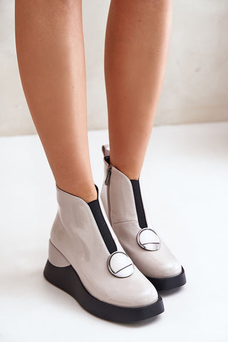 Step in Style Buskin Modern Twist Platform Booties