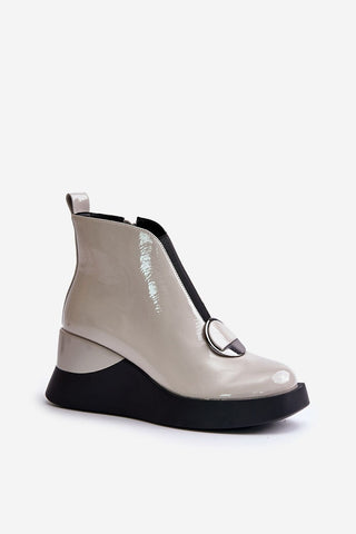 Step in Style Buskin Modern Twist Platform Booties