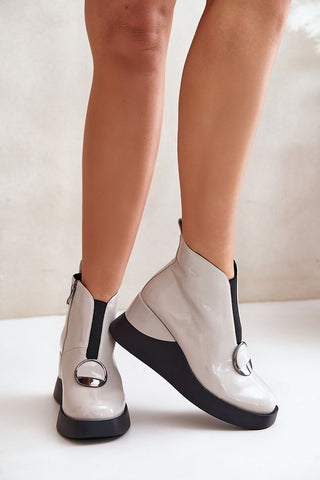 Step in Style Buskin Modern Twist Platform Booties