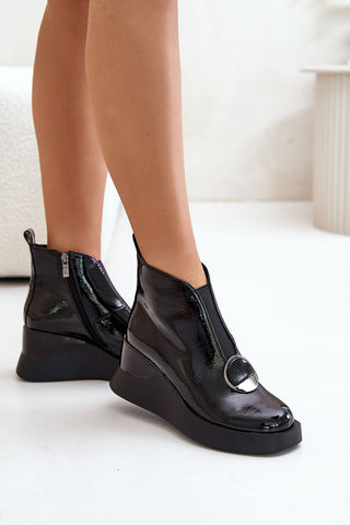 Step in Style Buskin Modern Twist Platform Booties